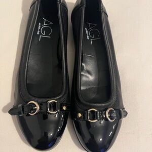 AGL Black Patent Leather Loafers with Gold Accents